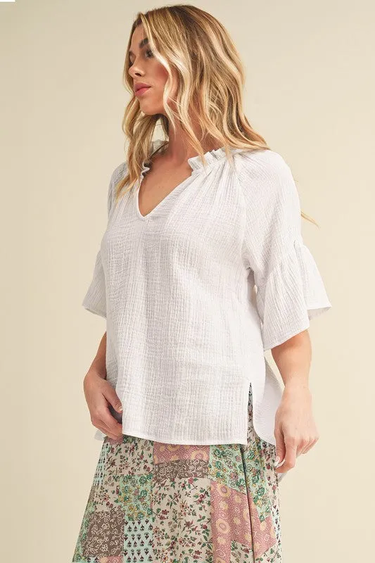 Aemi   Co Side Slit Notched Ruffled Half Sleeve Blouse