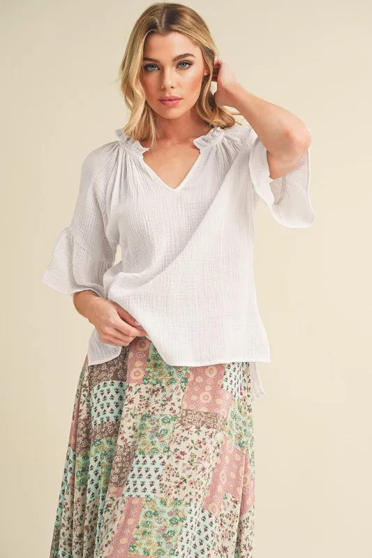 Aemi   Co Side Slit Notched Ruffled Half Sleeve Blouse