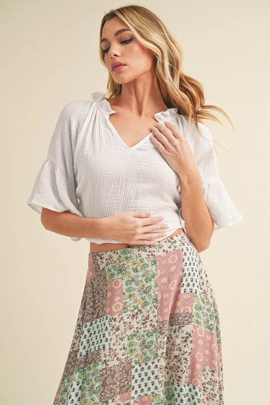 Aemi   Co Side Slit Notched Ruffled Half Sleeve Blouse