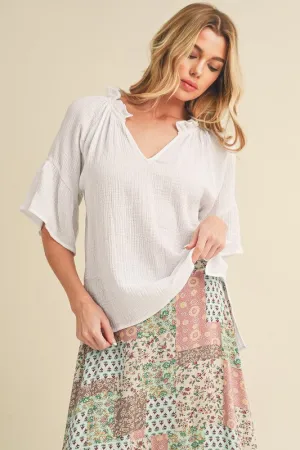 Aemi   Co Side Slit Notched Ruffled Half Sleeve Blouse