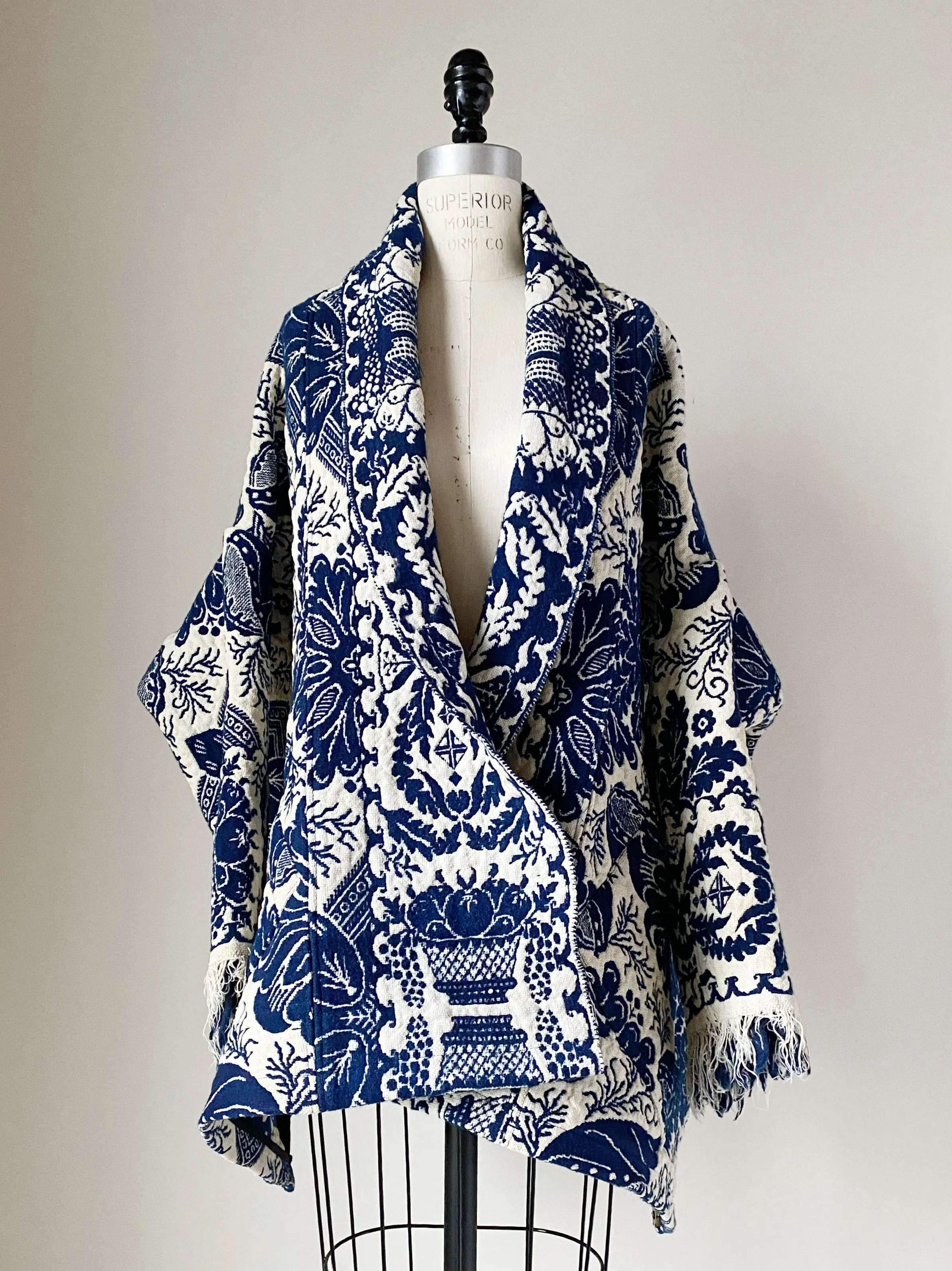 blue and off white antique coverlet cocoon
