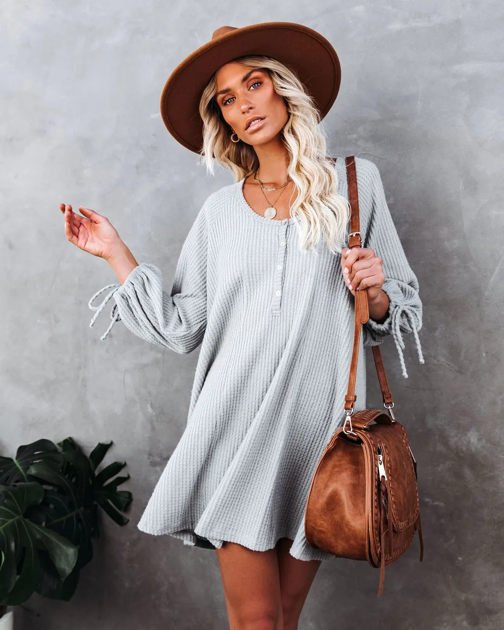 Knit Round Neck Ruffled Lace-up Mini Dresses