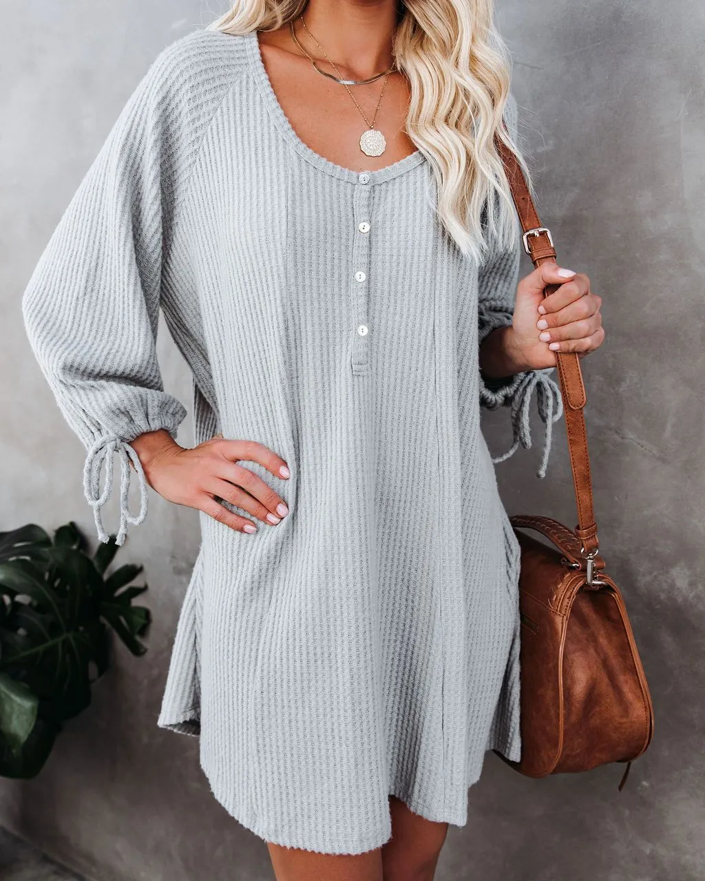 Knit Round Neck Ruffled Lace-up Mini Dresses