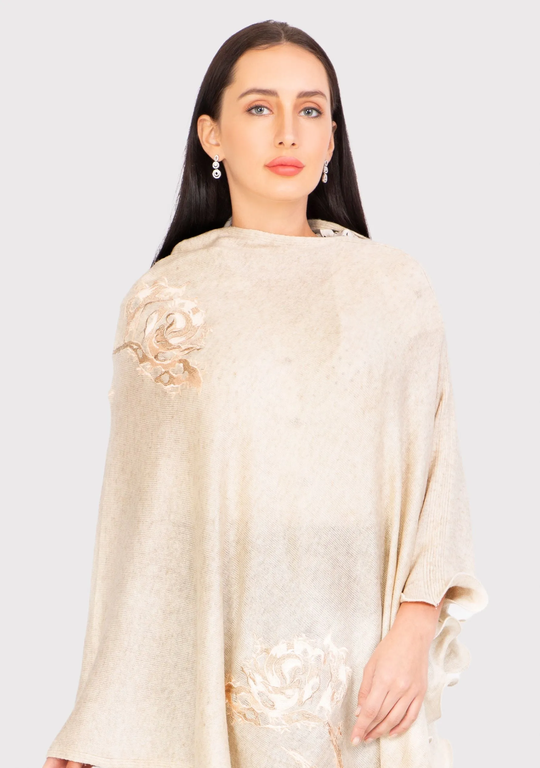 Oatmeal Melange Wool Poncho
Lt. Gold Appliqués